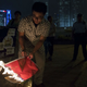 An activist burns the China's People's Liberation Army's flag to protest against the stationing of Chinese People's Liberation Army (PLA) forces in Hong Kong, at the Central Business District in Hong Kong August 1, 2014.